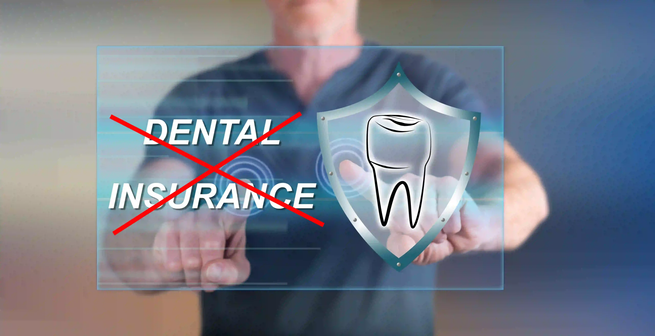 A dental insurance sign with a red cross across it