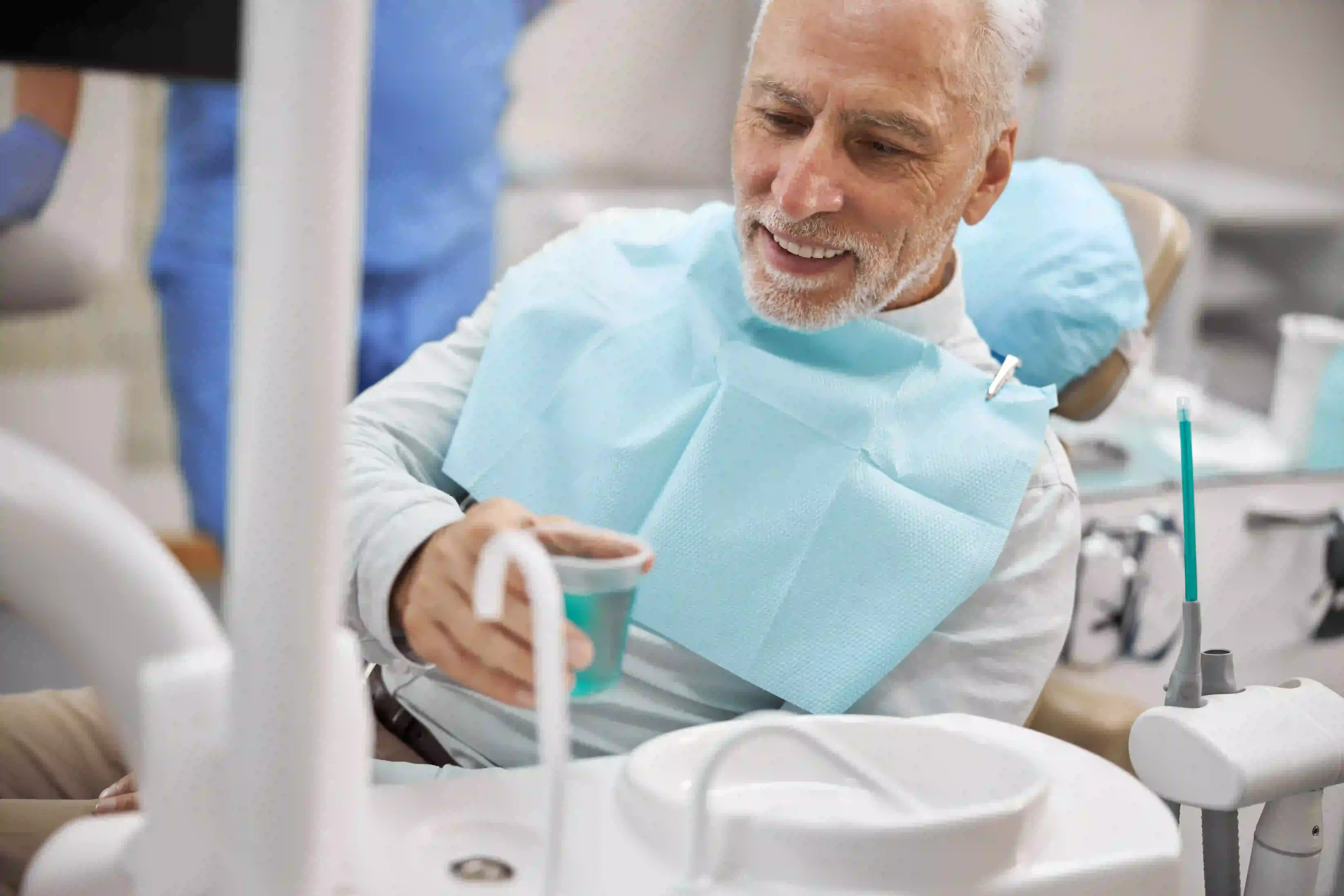 Patient in dentists chair getting treated